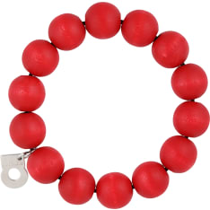 The classic, hand-dyed Pohjola bracelet is made of wooden beads and adorned with a silvery Aarikka logo. Ø 5.5 cm, flexible....