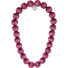 The Suomi necklace is made of hand-dyed wooden beads and is adorned with a metallic Aarikka logo. 44 cm, flexible. Handmade i...