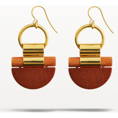 The Kelohonka earrings consists of hand-dyed wood cut to shape and jewellery metal. Length 5 cm, Ø 2,5 cm. Handmade in Finla...