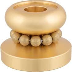 The Miniprinssi candleholder is the latest member of Aarikka candleholder family. The metallic candleholder fits a crown cand...