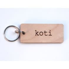 Kuusipohja Koti avaimenperä