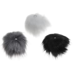 Spin a faux fur tassel