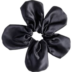 Cailap iso kukka musta hiusdonitsi